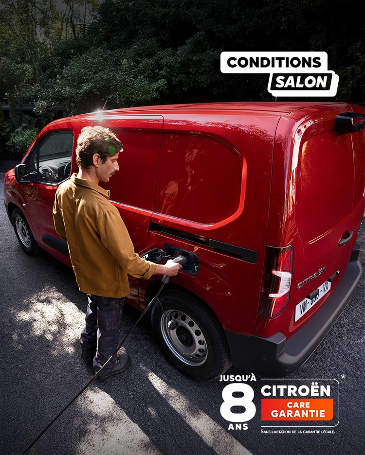 Man charging his red new ë-Berlingo Van