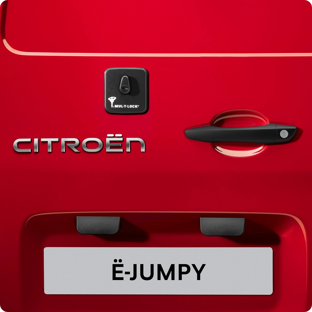 Close‑up exterior view of the rear door of a Citroën ë‑Jumpy, showing reinforced lock system and enhanced vehicle security.