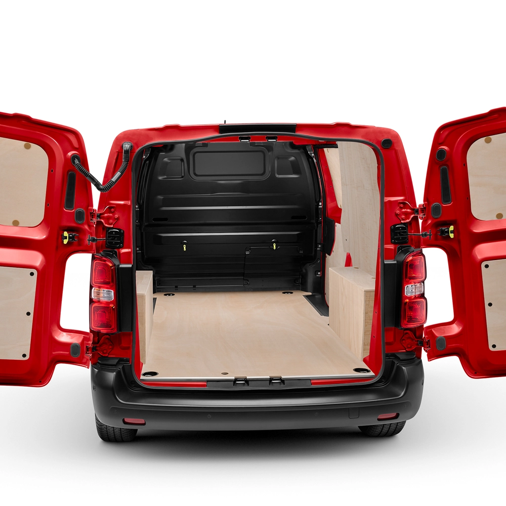 Rear exterior view of a Citroën Jumpy with rear doors open, showing a load protection kit, durable interior cladding and practical cargo space.