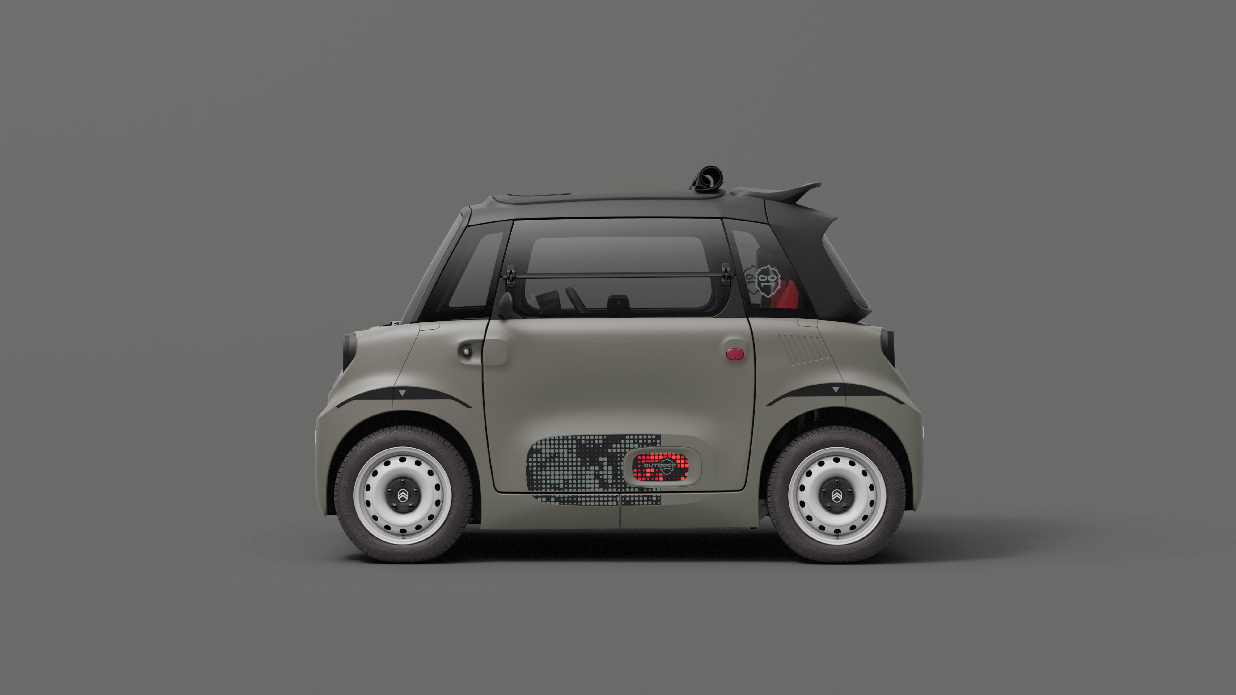 Vue de profil de Citroën Ami Outdoor avec toit ouvrant présentant un véhicule urbain électrique ultracompact facile à garer