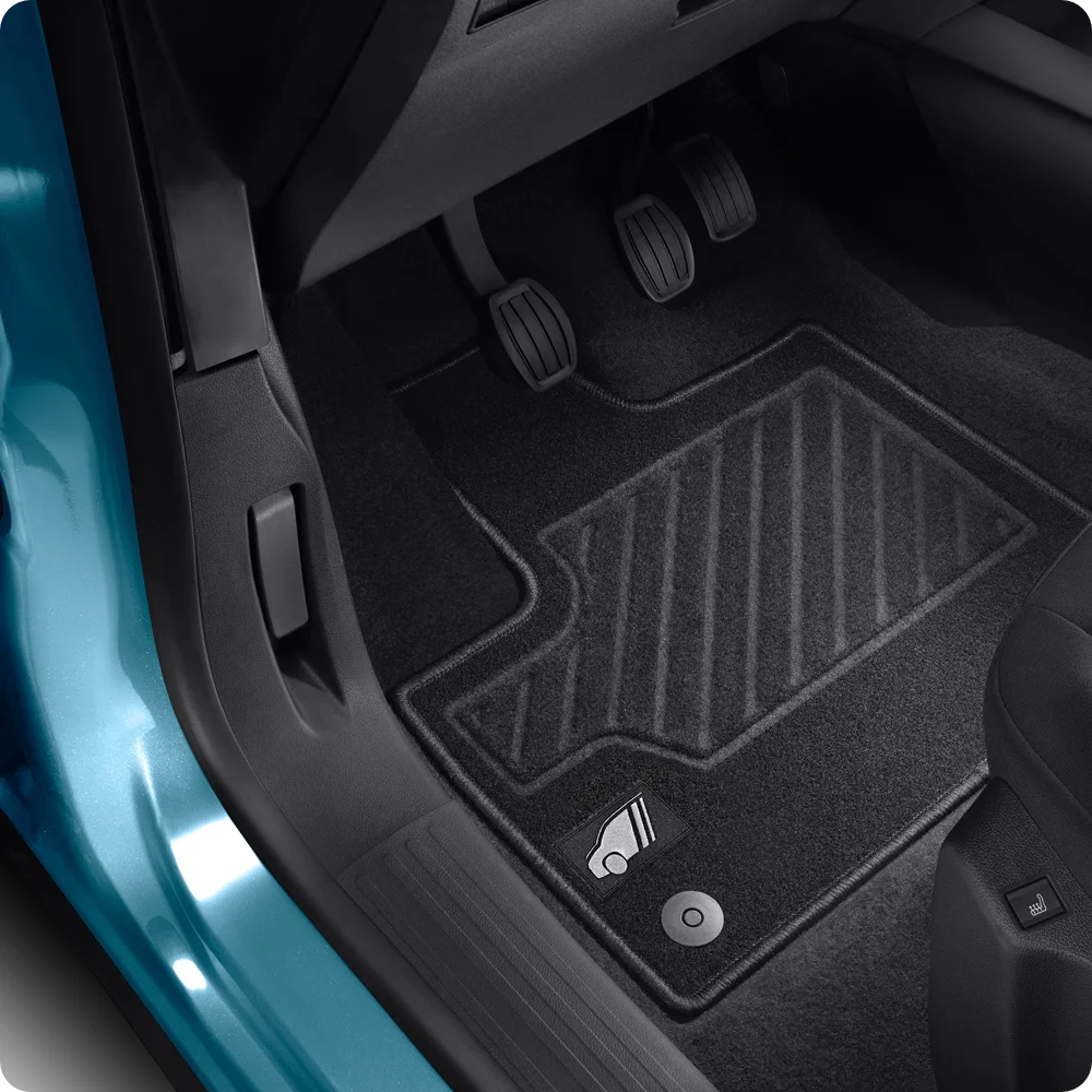 Les tapis de sol détaillent Berlingo montrant un matériau à poil d’aiguilles durable offrant protection, praticité et un confort quotidien amélioré