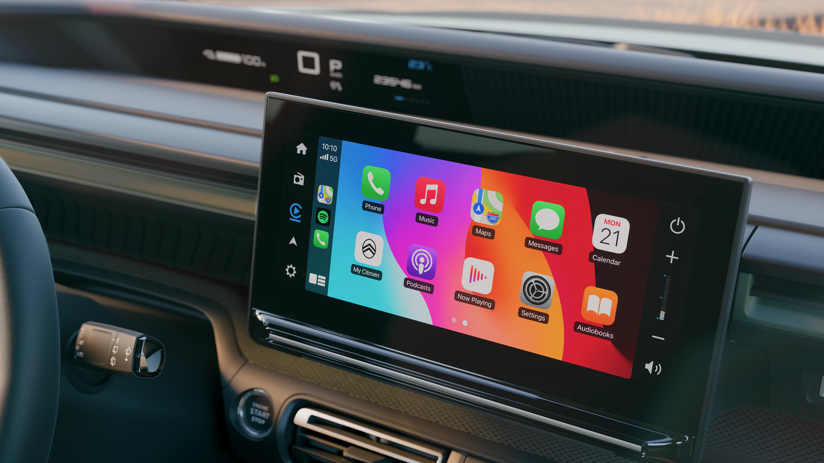Close-up van het dashboard van de Citroën ë-C3 Aircross met infotainmenttouchscreen, Apple CarPlay en connectiviteit voor een gezins-SUV