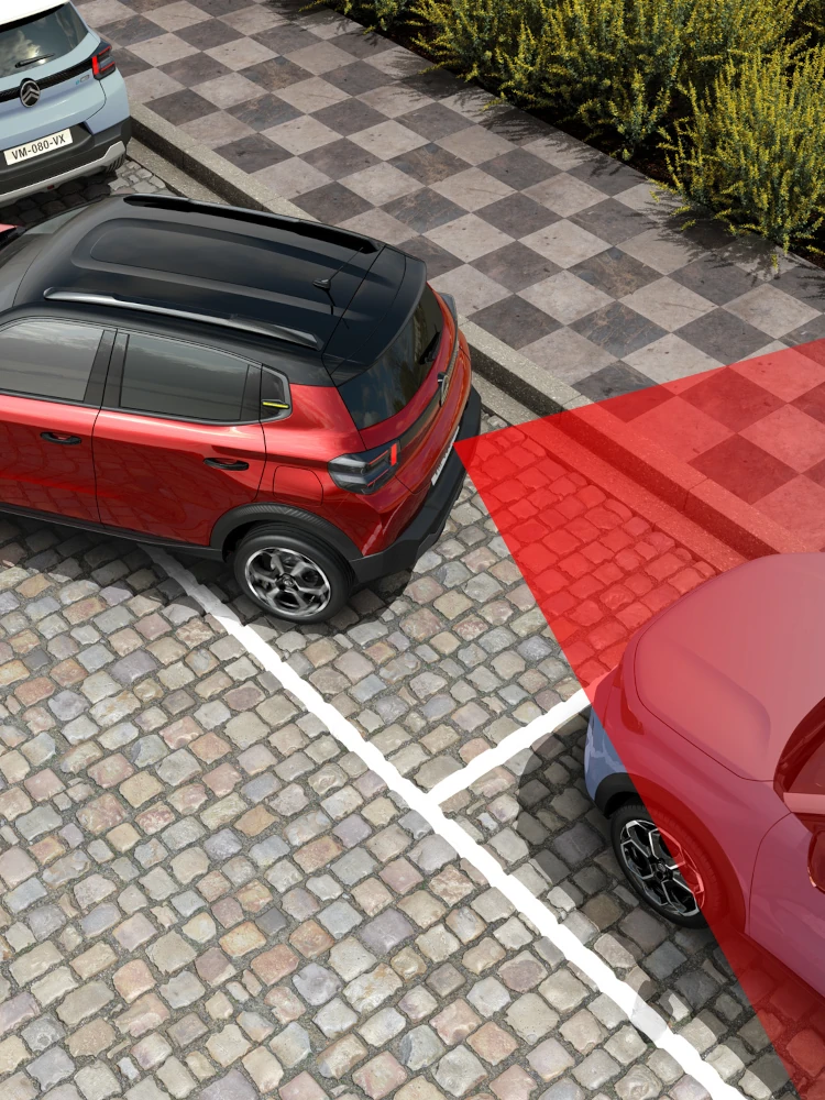 Top-down weergave van de Citroën ë-C3 elektrische SUV met achterparkeersensoren voor veiliger, zelfverzekerder en betaalbaarder stedelijk rijden.