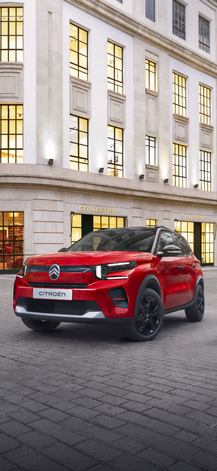 Voorste driekwart van de Citroën ë-C3 elektrische SUV benadrukt een gedurfd exterieurontwerp voor zelfverzekerde, efficiënte en betaalbare stedelijke mobiliteit.