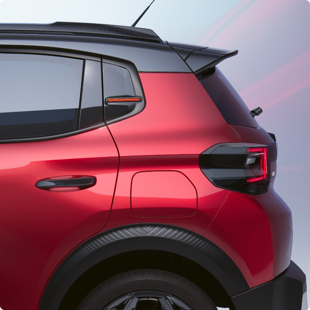 Detail rear side view Citroën ë-C3 electric city car distinctive taillight and design lines for urban style, smart EV alternative