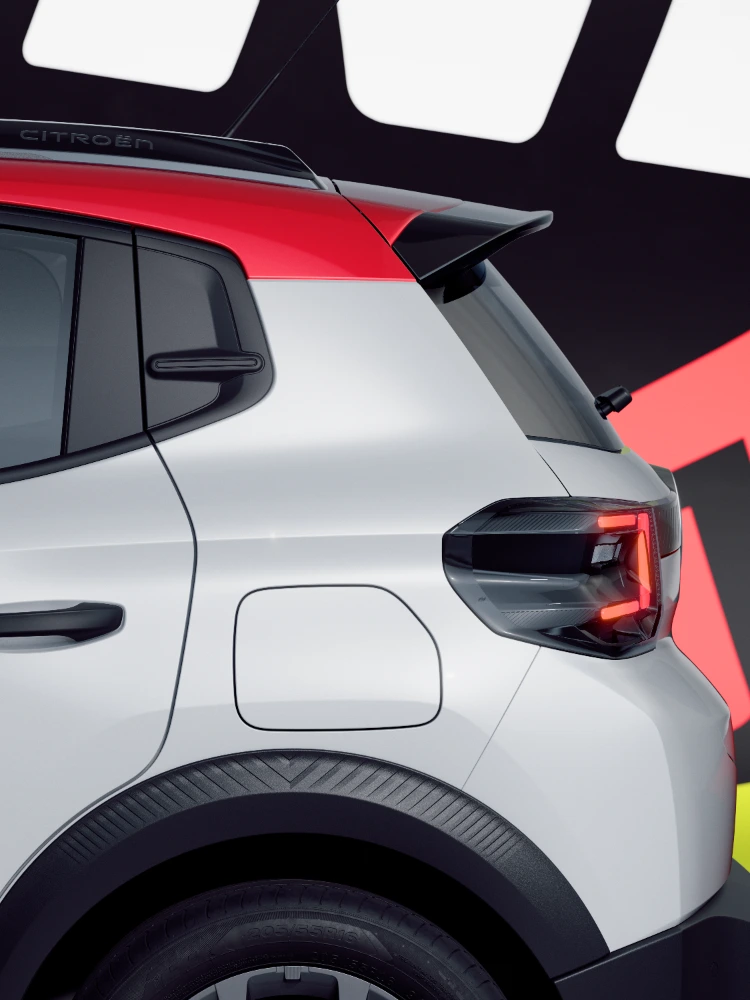 Achterkant in detail Citroën ë-C3 TONIC limited edition elektrische stadswagen achterlicht en achterkantstyling, modern EV-alternatief