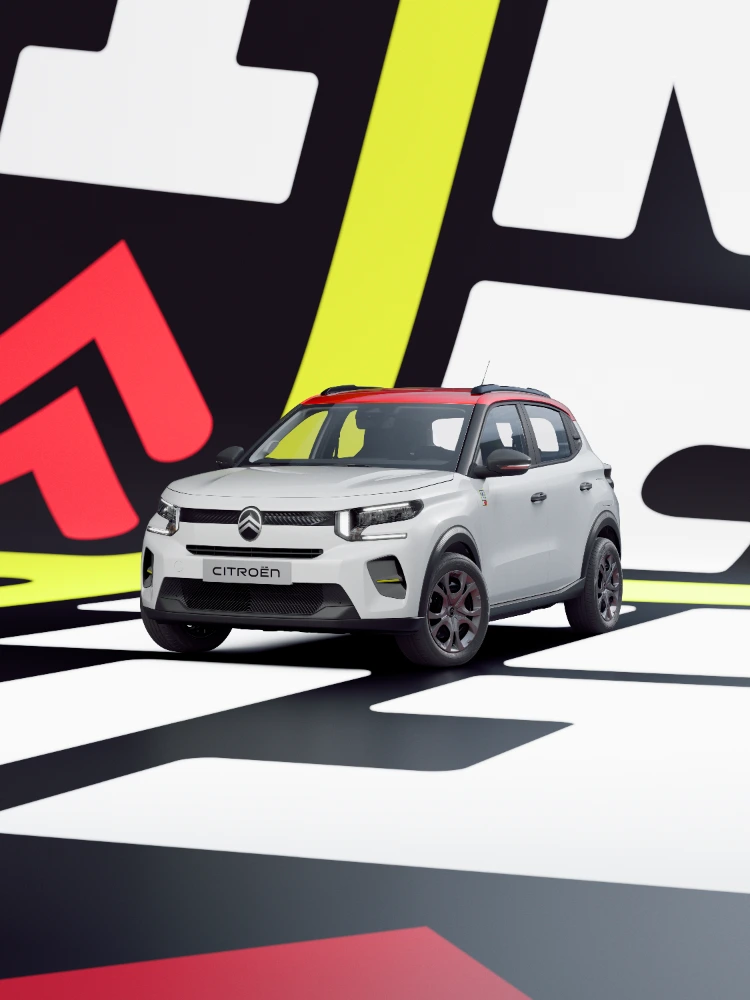 Voorkant driekwart aanzicht Citroën ë-C3 TONIC limited edition elektrische stadswagen dynamische uitstraling en grafische vormgeving, slim EV-alternatief