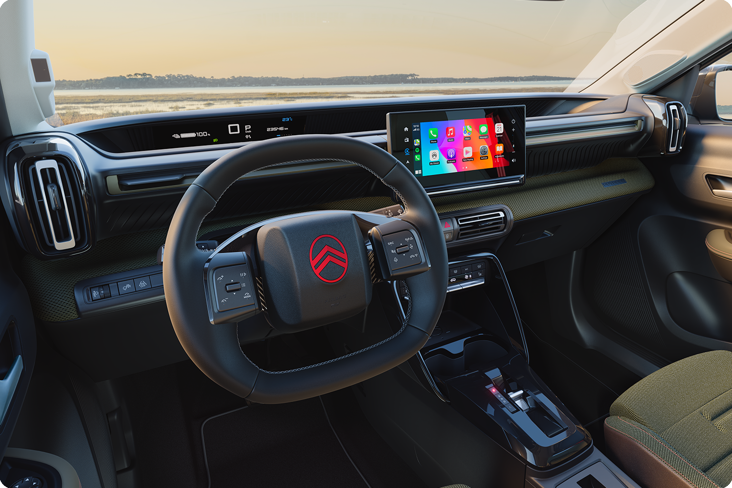 Gros plan sur le tableau de bord de Citroën C3 Outdoor, dont l’écran tactile offre la connectivité Advanced Comfort pour les trajets en SUV compact
